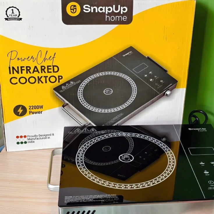 SnapUp home PowerChef Infrared Cooktop with packaging on a green background