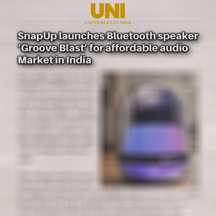 Blurred Bluetooth speaker with text about SnapUp launching 'Groove Blast' in India