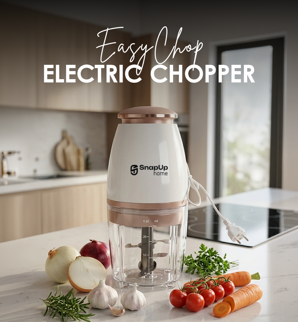 Electric chopper on a kitchen counter with vegetables, labeled 'Easy Chop Electric Chopper'.